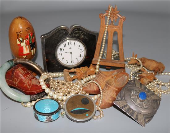 A silver and tortoiseshell mounted desk timepiece and assorted other items including necklaces.